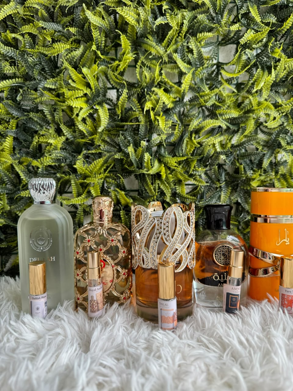 Frasco original de perfume importado ao lado do seu decant de 2ml